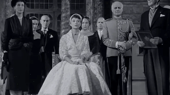 Gregory Peck và Audrey Hepburn trong cảnh quay phim Roman Holiday